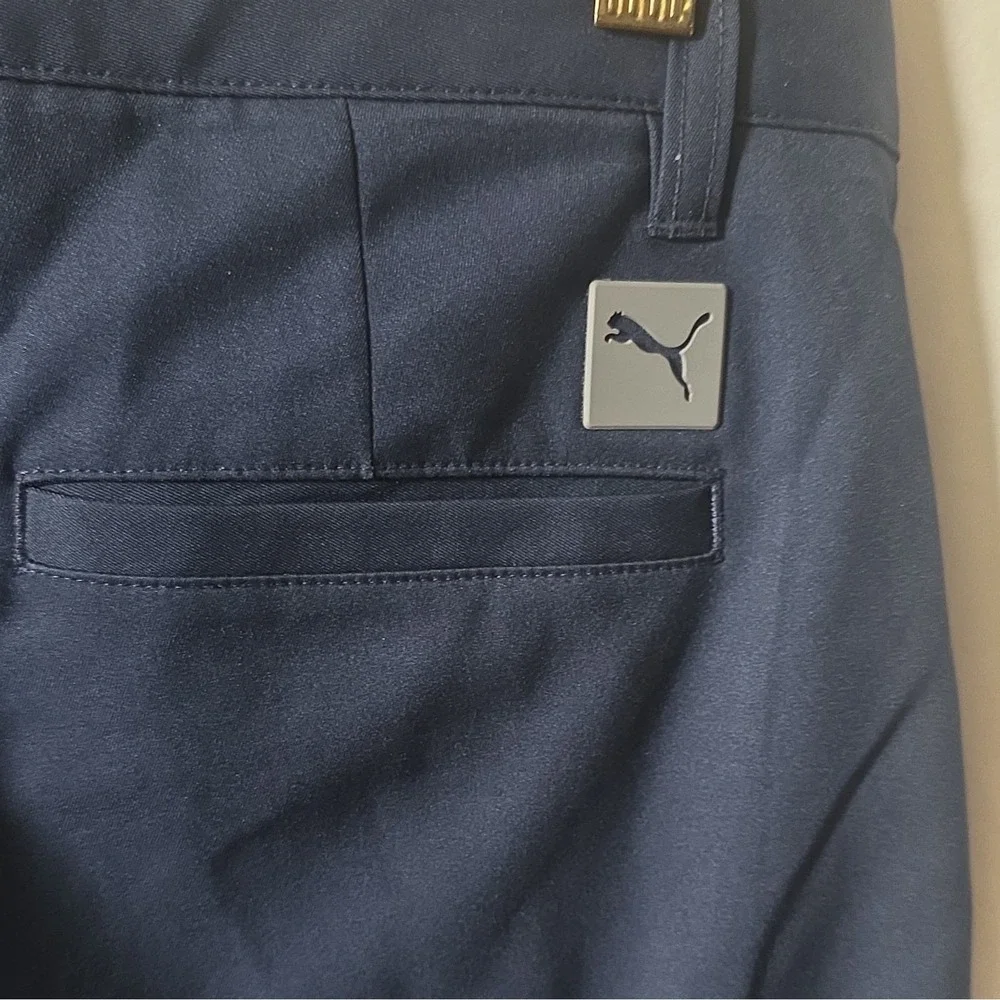 Puma youth boys navy performance shorts. Size large (13-14Y), made in Vietnam.